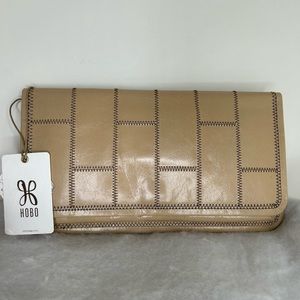 Used twice no more tags HOBO Beige Tan Patchwork Leather Clutch Wristlet